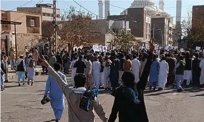  ?? Photograph: UGC/AFP/Getty Images ?? Protesters marching in Zahedan city, Sistan and Baluchista­n province.