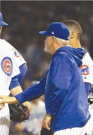  ?? | JONATHAN DANIEL/ GETTY IMAGES ?? Maddon in Game 2. He was the losing pitcher after allowing just three hits.