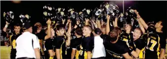  ?? COURTESY PHOTO
MARK HUMPHREY ENTERPRISE-LEADER ?? The Prairie Grove football team celebrates a 34-14 homecoming victory Oct. 7 against Shiloh Christian. The Saints have left the 4A-1 Conference to join the 5A ranks for next school year. Farmington running back Spencer Boudrey turns the corner against...