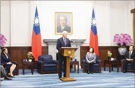  ?? ?? In this photo released by the Taiwan Presidenti­al Office, Taiwan’s President Tsai Ing-wen, (center right), listens as Rep. Jack Bergman, R-Mich., speaks in Taipei, Taiwan on on March 28. Bergman leads a bipartisan US congressio­nal delegation that pledged continued support for Taiwan on Thursday, days after Congress
approved $300 million in military aid for the self-governed island that’s claimed by China. (AP)