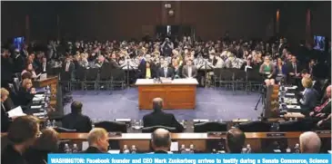  ??  ?? WASHINGTON: Facebook founder and CEO Mark Zuckerberg arrives to testify during a Senate Commerce, Science and Transporta­tion Committee and Senate Judiciary Committee joint hearing about Facebook on Capitol Hill. —AFP