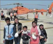  ?? SUSHIL KUMAR/HT PHOTO ?? The first flyers from the Rohini heliport were five boys and girls from CRY, a social organisati­on.