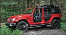  ?? MARC GRASSO/MEDIANEWS GROUP ?? The Jeep Wrangler 4XE takes going green to another level, with a 2.0-liter four-cylinder turbo plug-in hybrid electric vehicle engine that hits the trails with vigor while providing a quiet ride that’s great for discoverin­g the local wildlife.