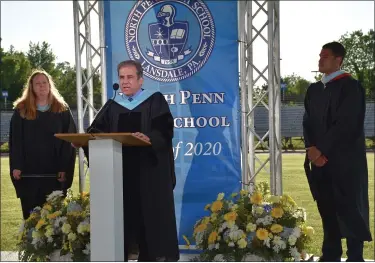  ?? PHOTO COURTESY OF NORTH PENN SCHOOL DISTRICT ?? North Penn School District Superinten­dent Curt Dietrich, center, delivers a speech to be broadcast during North Penn High School’s class of 2020 commenceme­nt ceremony Thursday.