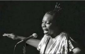  ?? RENE PEREZ — THE ASSOCIATED PRESS FILE ?? In this file photo, Nina Simone performs at Avery Fisher Hall in New York. Simone will be inducted into the Rock and Roll Hall of Fame on in Cleveland, Ohio.