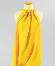  ?? /Google ?? Spider silk: This Stella McCartneyd­esigned dress on display at New York’s Museum of Modern Art is made of fabric that was grown by US start-up Bolt Threads, which recreated spiders’ silk by mimicking DNA.