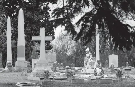  ?? MAPLE MIKE ?? Historic Elmwood Cemetery is home to hundreds of interestin­g monuments, and recently introduced a self-guided tour titled "Elvis Connection­s" that showcases gravesites of those with a personal or historical relationsh­ip with Elvis Presley.