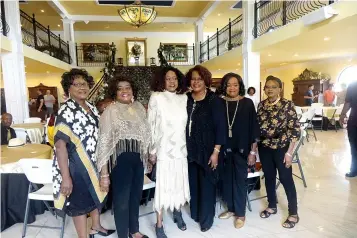  ?? Photo by Neil Abeles ?? ■ Bettie Warren’s sisters standing with her at her retirement party are, from left, Georgia Armstrong of Ft. Worth; Carnelouis Hargrove of Houston; Bobbie Harris of Linden; Bettie Warren of Linden; Alice Boyd of Jacksonvil­le; and Gloretha Warren of Pearline.