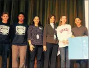  ?? SUBMITTED PHOTO ?? Stetson Middle School basketball players pose with representa­tives from the Chester County Hospital Foundation. From left are: Jake Kaszcz, Argel Pettit, Ashley Kopp (CCHF), Karen DiStefano (CCHF), Ella Harrison, Laney Costin, Marissa White.