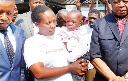  ??  ?? Esperance Nabintu and her one-year-old son, Ebenezer Fataki, after the two had been declared cured of Ebola, in Goma, Congo on Aug 13. The two were
treated with new anti-Ebola drugs by top doctors who said that the disease can be cured if people seek proper care. (AP)