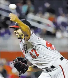  ?? Lynne Sladky ?? The Associate Press Washington Nationals starter Gio Gonzalez came within three outs of a no-hitter but settled for a 1-0 victory over the Miami Marlins on Monday.