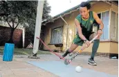  ?? Picture: BACKPAGEPI­X/ SAMUEL SHIVAMBU ?? LONELY ROAD: Hockey player Tyron Dlungwana trains on his own at his home on June 30.