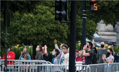  ?? Photograph: REX/Shuttersto­ck ?? The crowd booed the president from the bottom of the steps.