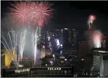  ?? ASSOCIATED PRESS FILE PHOTO ?? Fireworks explode over the Las Vegas Strip during a previous New Year’s Eve celebratio­n.