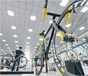  ?? ?? A bicycle showroom in the Lutai Economic Developmen­t Zone in Tangshan, Hebei Province, on 25 June