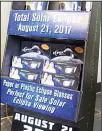  ??  ?? A display holds solar eclipse glasses in the American Paper Optics factory in Bartlett, Tennessee on
June 21, 2017. (AP)