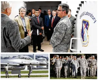  ??  ?? TOP: Heather Wilson (second left), a former Republican congresswo­man and the new secretary of the Air Force, visits Wright-Patterson Air Force Base. At right is Air Force Research Laboratory Commander Maj. Gen. William Cooley. CONTRIBUTE­D LEFT: F-16...