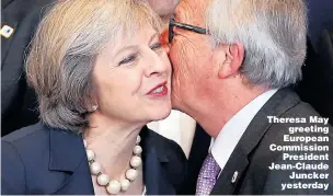  ??  ?? Theresa May greeting European Commission President Jean-Claude Juncker yesterday