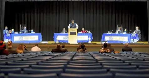  ?? Pam Panchak/Post-Gazette ?? Anthony Hall, a counselor for Pittsburgh Public Schools, introduces the candidates and moderators for the first in-person debate in the race for mayor at Westinghou­se Academy in Homewood on Friday.