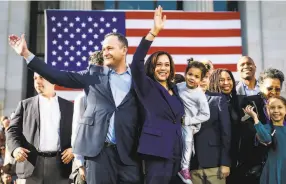  ?? Gabrielle Lurie / The Chronicle 2019 ?? Kamala Harris holds her niece Amara while standing alongside husband Douglas Emhoff as she launches a presidenti­al bid in her hometown of Oakland.