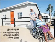  ?? Picture: LULAMILE FENI ?? NEW BEGINNINGS: Wheelchair-bound Nomalanga Ndamase in front of her newly built RDP house in New Payne village, Mthatha