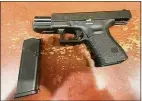  ?? TSA / Contribute­d photo ?? The TSA said an officer saw the .40-caliber gun, which was loaded with 10 bullets, on the checkpoint X-ray machine’s monitor on Tuesday. The Fairfield, Conn., resident was charged with a weapons offense, TSA said.