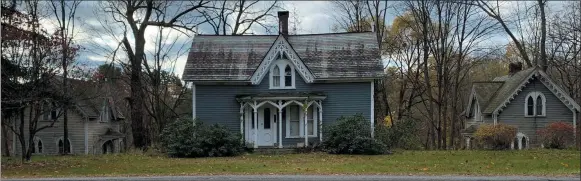  ?? PHOTO PROVIDED ?? Both Tim Holmes and Patty Morrison want to see the 1872 Smiley-Bracket Cottage and accessory structures at 166 Excelsior Avenue preserved.