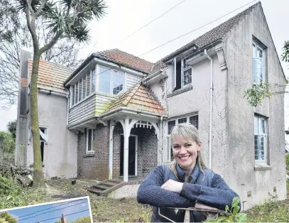  ?? PHOTOS: GERARD O’BRIEN ?? Labour of love . . . (Clockwise from above) Melanie Kerr takes a breather outside the Tolcarne Ave home she is renovating; one of the original fireplaces; the landing at the top of the stairs; A view of the home from the street.