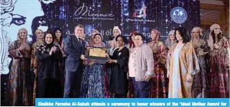  ?? —KUNA photos ?? Sheikha Fareeha Al-Sabah attends a ceremony to honor winners of the ‘Ideal Mother Award for Outstandin­g Family’.