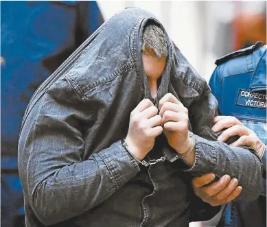  ??  ?? Convicted killer Jaymes Todd is led into the Supreme Court of Victoria for sentencing on Monday.