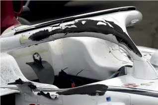  ??  ?? The scars of the impact were plain to see, but many sceptics still denied the device had any part in protecting Charles Leclerc from injury