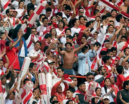 ?? PHOTO: REUTERS ?? Electric scenes in Lima as Peru qualify for the Fifa World Cup interconti­nental playoff against the All Whites.