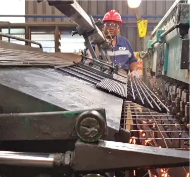  ?? ?? Steel wire mesh production using state of the art automatic welding machines.