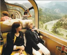  ?? Los Angeles Times 2013 ?? Guests in GoldLeaf Service travel in the custom-built bi-level, glass-domed coach of the Rocky Mountainee­r, which offers panoramic views of the Canadian Rockies from the upper level.