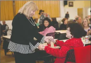  ?? BEA AHBECK/NEWS-SENTINEL ?? Mary Grimwood, of Granite Bay, left, chats with Pat Yankee as Yankee waits to perform with Cell Block 7 jazz band at the American Legion Hall in Lodi on Tuesday.