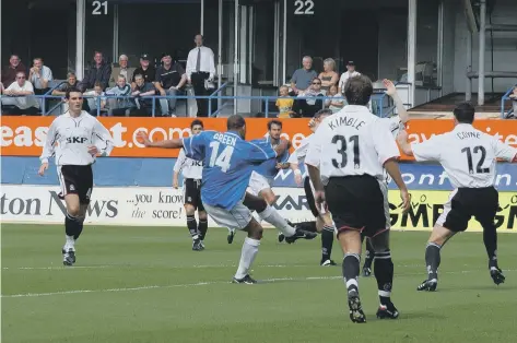  ??  ?? Francis Green scores for Posh at Luton Town on the opening day of the 2002-03 Division Two season