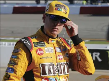  ?? AP PHOTO/STEVE HELBER ?? Kyle Busch gets ready to qualifying for a NASCAR Cup Series auto race at Richmond Raceway in Richmond, Va., on Friday.