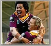  ?? Photo: Kelly Defina ?? IN THE BIG LEAGUE: Broncos teammates Maitua Feterika and Julia Robinson celebrate a try last season.