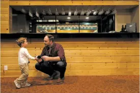  ?? Photos by Yalonda M. James / The Chronicle ?? Josephine Di Grande, from top, chats with Sheila and George Birmingham at Gold Mirror on Taraval; Conor Costello, 2, and Connor Patterson at the restaurant; Roberto Di Grande in the kitchen.