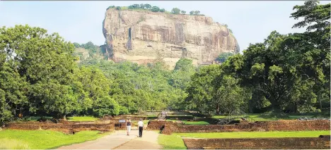  ?? ELAINE O’CONNOR ?? Sigiriya is a 200-metre-high rock rising out from the green tropical forest, and just one marvel of many to see in Sri Lanka.