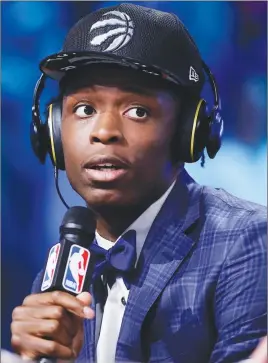  ?? AP PHOTO ?? OG Anunoby answers questions during an interview after being selected by the Toronto Raptors as the 23rd pick during the NBA draft Thursday in New York.