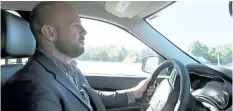  ?? BILL GORMAN/THE ASSOCIATED PRESS ?? In this image from video, Jake Nelson, AAA’s director for traffic safety advocacy and research drives one of the test vehicles used in the study.