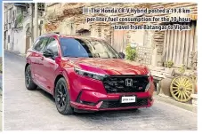  ?? ?? ■ The Honda CR-V Hybrid posted a 19.8 km per liter fuel consumptio­n for the 10-hour travel from Batangas to Vigan.