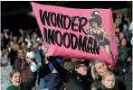  ?? GETTY IMAGES ?? A fan displays a poster supporting Black Ferns star winger Portia Woodman during their first Rugby World Cup match against Australia.