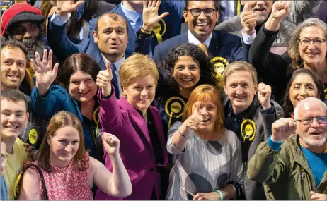  ?? ?? First Minister Nicola Sturgeon with SNP candidates and supporters at the Glasgow City Council count at the Emirates Arena during the local government election
Picture: Jane Barlow