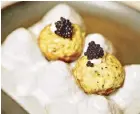 ?? ?? Chef Chele Gonzalez’s Potato & Caviar Takoyaki with truffle, egg and onion