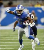  ?? PAUL SANCYA — THE ASSOCIATED PRESS ?? Detroit Lions wide receiver Golden Tate (15) runs after a catch during a game against the New England Patriots in last week. The Philadelph­ia Eagles acquired Tate from the Detroit Lions in a trade Tuesday for a third-round draft pick next year.