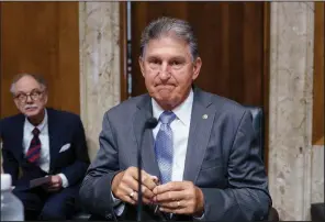  ?? (AP/J. Scott Applewhite) ?? Sen. Joe Manchin, chairman of the Senate Energy and Natural Resources Committee, arrives for a hearing at the Capitol on Tuesday. Manchin has said that “inaction is not an option” when it comes to voting rights, but he has frustrated fellow Democrats and voting-rights groups by saying his backing for any legislatio­n is contingent on Republican support.