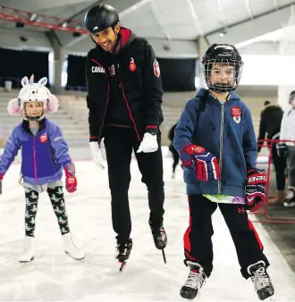  ?? DARREN MAKOWICHUK ?? The Olympic Oval needs upgrades in a number of areas. Above, Rebecca and Alex Brown skate with Olympic speedskate­r Gilmore Junio, as Canada’s Olympic and Paralympic athletes held a celebratio­n of sport in support of Calgary 2026 by hosting a free family event earlier this month.