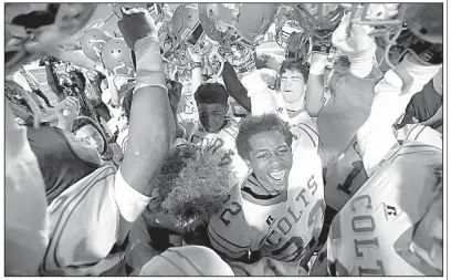  ?? Arkansas Democrat-Gazette/THOMAS METTHE ?? Rivercrest players celebrate after Friday night’s victory over Junction City in the Class 3A state championsh­ip game at War Memorial Stadium. It was Rivercrest’s third state title.